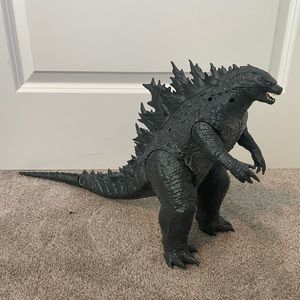 Godzilla toy with moveable limbs